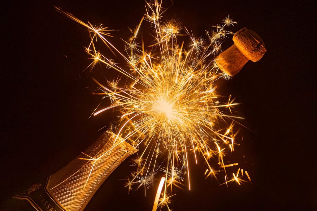 ACCUEIL Celebrate with a champagne explosion and sparklers. Perfect for New Year or party scenes.